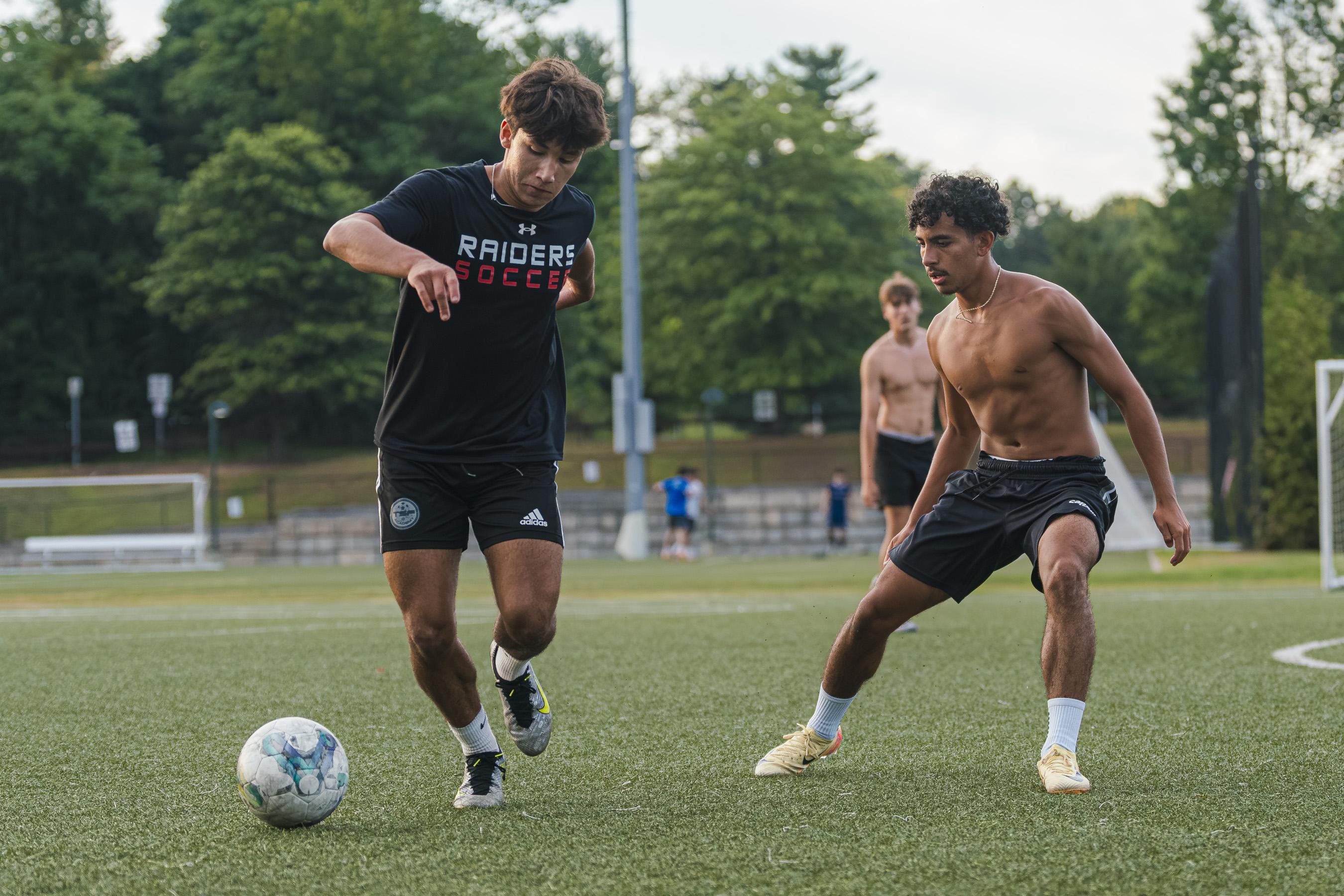 Players training on the pitch